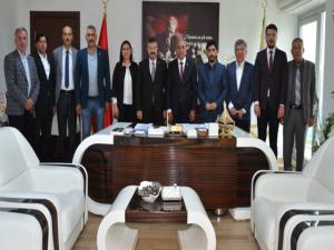 İl Başkanı Özmenden Kaplana Hayırlı olsun ziyareti